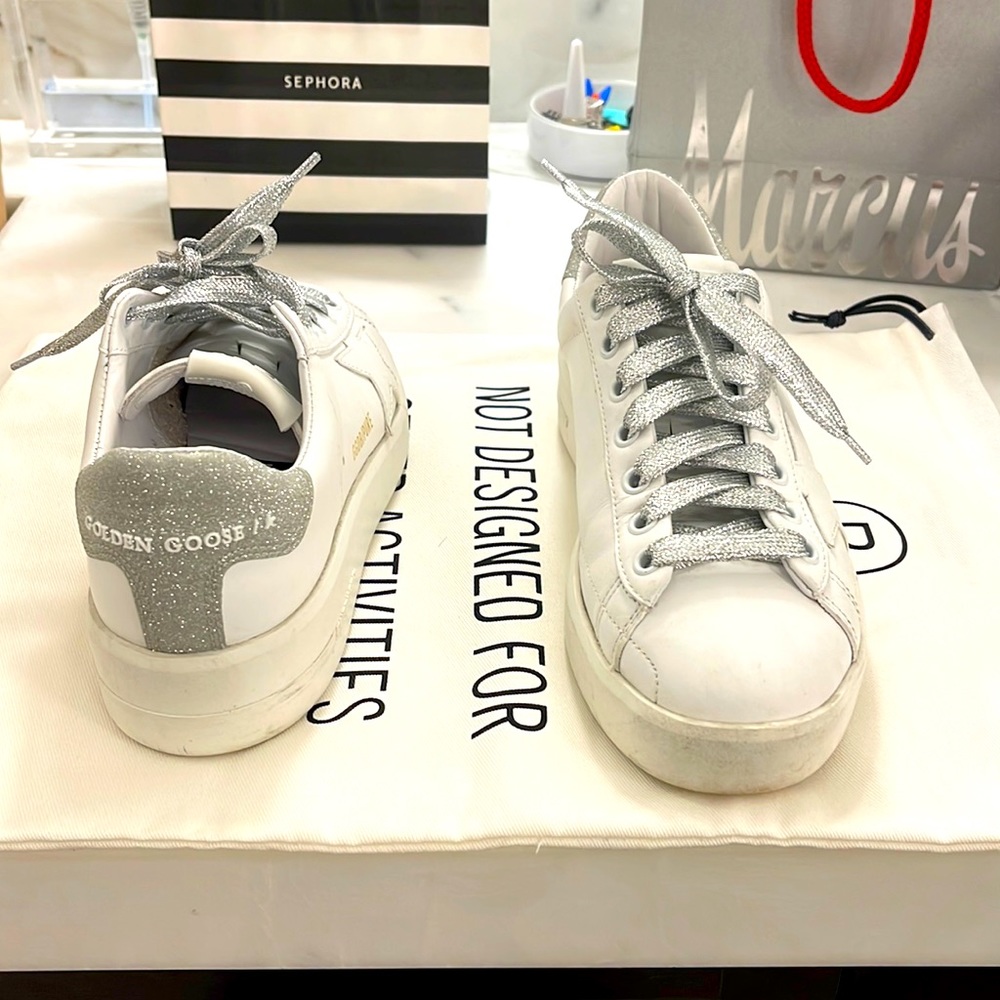 Golden goose size 35 white all star with silver back. Comes with box and pouch
